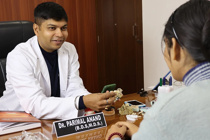 Dentist With Patient